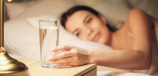 Is drinking water right before sleeping good or bad?